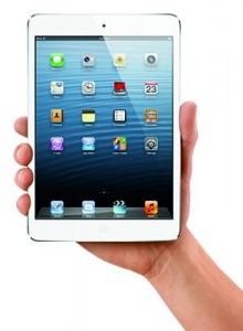 Hand holding an iPad mini.